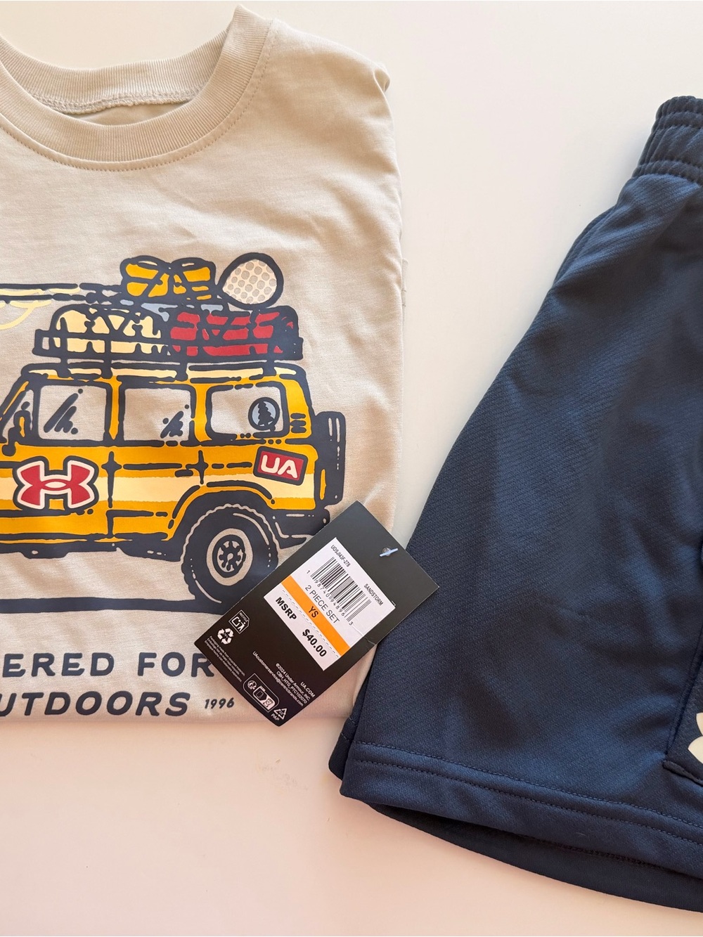 Under Armour Beige Graphic Tee and Navy Athletic Shorts